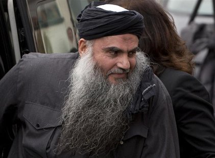Radical Muslim cleric Abu Qatada arrives back at his home after being released on bail, in London in this November 13, 2012 file photograph. Radical Muslim cleric Abu Qatada arrives back at his home after being released on bail, in London in this November 13, 2012 file photograph.