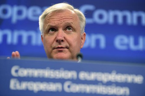 European Economic and Monetary Affairs Commissioner Olli Rehn attends a news conference at the European Commision in Brussels June 5, 2013. European Economic and Monetary Affairs Commissioner Olli Rehn attends a news conference at the European Commision in Brussels June 5, 2013.