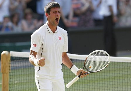 Novak Djokovic of Serbia celebrates after defeating Juan Martin del Potro of Argentina in their men's semi-final tennis match at the Wimbled Novak Djokovic of Serbia celebrates after defeating Juan Martin del Potro of Argentina in their men's semi-final tennis match at the Wimbled