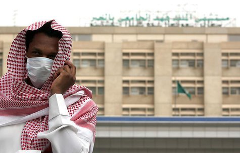 A man, wearing a surgical mask as a precautionary measure against the novel coronavirus, walks near a hospital in Khobar city in Dammam May A man, wearing a surgical mask as a precautionary measure against the novel coronavirus, walks near a hospital in Khobar city in Dammam May
