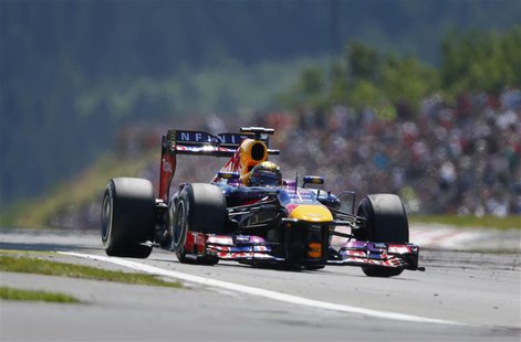 Red Bull Formula One driver Sebastian Vettel of Germany drives during the German F1 Grand Prix at the Nuerburgring circuit, July 7, 2013. RE Red Bull Formula One driver Sebastian Vettel of Germany drives during the German F1 Grand Prix at the Nuerburgring circuit, July 7, 2013. RE