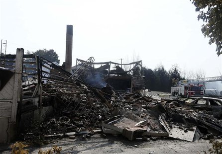 Burnt out buildings are seen near the wreckage of a train derailment in Lac Megantic, Quebec, July 7, 2013. REUTERS/Christinne Muschi Burnt out buildings are seen near the wreckage of a train derailment in Lac Megantic, Quebec, July 7, 2013. REUTERS/Christinne Muschi