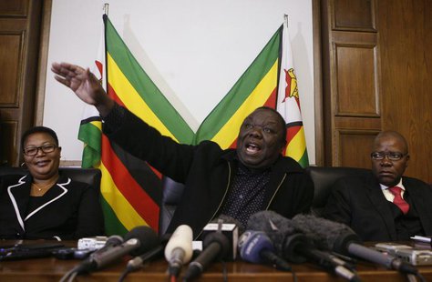 Zimbabwe Prime Minister and leader of the opposition Movement for Democratic Change (MDC) Morgan Tsvangirai gestures during a news conferenc Zimbabwe Prime Minister and leader of the opposition Movement for Democratic Change (MDC) Morgan Tsvangirai gestures during a news conferenc