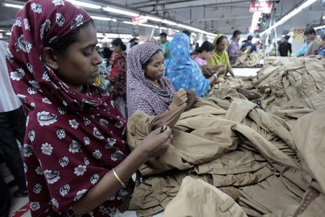 Women work at a garment factory in Savar July 27, 2012. REUTERS/Andrew Biraj Women work at a garment factory in Savar July 27, 2012. REUTERS/Andrew Biraj