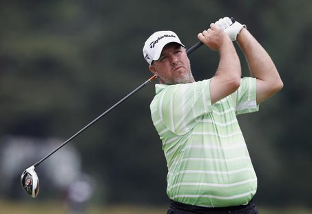 Boo Weekley of the U.S. tees off on the 14th hole during the first round of the 2013 U.S. Open golf championship at the Merion Golf Club in Boo Weekley of the U.S. tees off on the 14th hole during the first round of the 2013 U.S. Open golf championship at the Merion Golf Club in