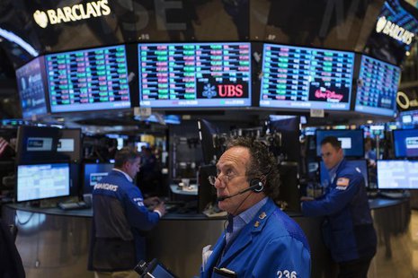 A trader works on the floor of the New York Stock Exchange as it closes for the week, July 5, 2013. REUTERS/Lucas Jackson A trader works on the floor of the New York Stock Exchange as it closes for the week, July 5, 2013. REUTERS/Lucas Jackson