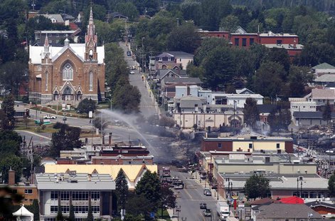 A view of the town from a lookout point at Lac Megantic, Quebec, July 7, 2013. REUTERS/Christinne Muschi A view of the town from a lookout point at Lac Megantic, Quebec, July 7, 2013. REUTERS/Christinne Muschi