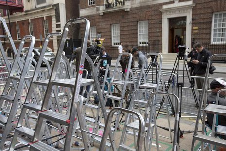 Photographers and television crews mark out positions in front of the door to the Lindo Wing of St Mary's Hospital, where Britain's Catherin Photographers and television crews mark out positions in front of the door to the Lindo Wing of St Mary's Hospital, where Britain's Catherin
