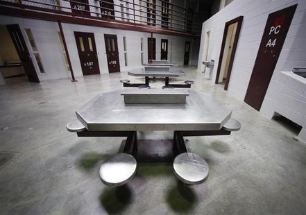 The interior of an unoccupied communal cellblock is seen at Camp VI, a prison used to house detainees at the U.S. Naval Base at Guantanamo B The interior of an unoccupied communal cellblock is seen at Camp VI, a prison used to house detainees at the U.S. Naval Base at Guantanamo B