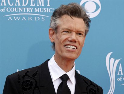 Singer Randy Travis arrives at the 45th annual Academy of Country Music Awards in Las Vegas, Nevada in this April 18, 2010 file photo. REUTE Singer Randy Travis arrives at the 45th annual Academy of Country Music Awards in Las Vegas, Nevada in this April 18, 2010 file photo. REUTE