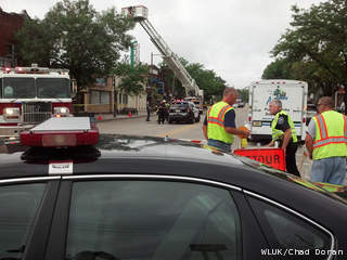 A stretch of W. College Ave. in Appleton is closed to traffic July 8, 2013, after the roof collapsed at Sign Works, 809 W. College Ave. Heavy rains were believed to be the cause of the collapse. (courtesy of FOX 11). A stretch of W. College Ave. in Appleton is closed to traffic July 8, 2013, after the roof collapsed at Sign Works, 809 W. College Ave. Heavy rains were believed to be the cause of the collapse. (courtesy of FOX 11).