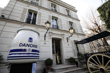 A general view with a giant jar of yogurt is seen outside the exhibition to mark the 90th anniversary of the French foods company Danone, in A general view with a giant jar of yogurt is seen outside the exhibition to mark the 90th anniversary of the French foods company Danone, in