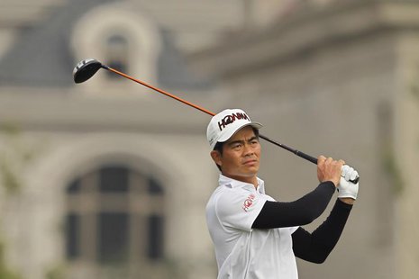 Liang Wenchong of China plays a shot on the first hole during the BMW Masters 2012 golf tournament at Lake Malaren Golf Club in Shanghai, Oc Liang Wenchong of China plays a shot on the first hole during the BMW Masters 2012 golf tournament at Lake Malaren Golf Club in Shanghai, Oc