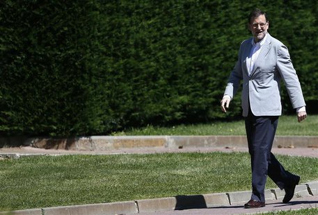 Spain's Prime Minister Mariano Rajoy arrives at an annual FAES conference event in Guadarrama, outside Madrid July 7, 2013. REUTERS/Javier B Spain's Prime Minister Mariano Rajoy arrives at an annual FAES conference event in Guadarrama, outside Madrid July 7, 2013. REUTERS/Javier B