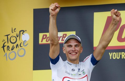 Argos-Shimano team rider Marcel Kittel of Germany celebrates on the podium after he won the 213 km first stage of the centenary Tour de Fran Argos-Shimano team rider Marcel Kittel of Germany celebrates on the podium after he won the 213 km first stage of the centenary Tour de Fran