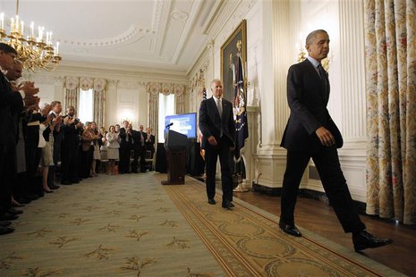 U.S. President Barack Obama (R) leaves with Vice President Joe Biden (2nd L) after delivering remarks on his management agenda in the State U.S. President Barack Obama (R) leaves with Vice President Joe Biden (2nd L) after delivering remarks on his management agenda in the State