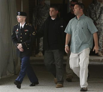 U.S. Army Private First Class Bradley Manning (L) is escorted out after a day of testimony at his court martial trial at Fort Meade, Marylan U.S. Army Private First Class Bradley Manning (L) is escorted out after a day of testimony at his court martial trial at Fort Meade, Marylan