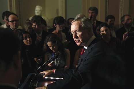 U.S. Senate Majority Leader Harry Reid (D-NV) addresses reporters after the weekly Democratic caucus luncheon at the U.S. Capitol in Washing U.S. Senate Majority Leader Harry Reid (D-NV) addresses reporters after the weekly Democratic caucus luncheon at the U.S. Capitol in Washing