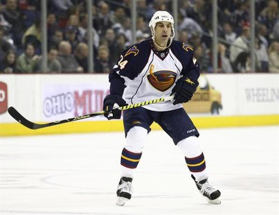 Atlanta Thrashers' Chris Chelios skates down the ice against the Columbus Blue Jackets during the first period of their NHL hockey game in C Atlanta Thrashers' Chris Chelios skates down the ice against the Columbus Blue Jackets during the first period of their NHL hockey game in C