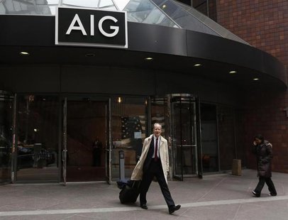 A man exits the AIG headquarters offices in New York's financial district, January 9, 2013. REUTERS/Brendan McDermid A man exits the AIG headquarters offices in New York's financial district, January 9, 2013. REUTERS/Brendan McDermid