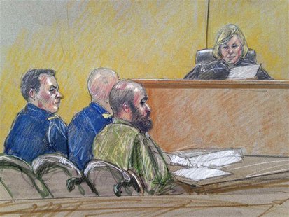 U.S. Army Major Nidal Hasan (C), accused of killing 13 soldiers in a 2009 Fort Hood shooting rampage, is seen in a courtroom sketch as he si U.S. Army Major Nidal Hasan (C), accused of killing 13 soldiers in a 2009 Fort Hood shooting rampage, is seen in a courtroom sketch as he si