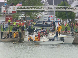 Emergency responders search the channel of the Kewaunee River on Sunday, June 23, 2013. (courtesy of FOX 11). Emergency responders search the channel of the Kewaunee River on Sunday, June 23, 2013. (courtesy of FOX 11).