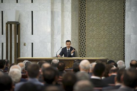 Syria's President Bashar al-Assad heads the plenary meeting of the central committee of the ruling al-Baath party, in Damascus in this hando Syria's President Bashar al-Assad heads the plenary meeting of the central committee of the ruling al-Baath party, in Damascus in this hando