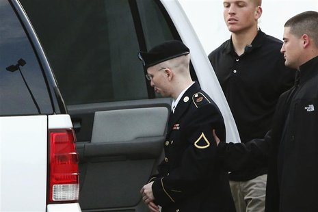 U.S. Army Private First Class Bradley Manning (C) is escorted out after a day of testimony at his court martial trial at Fort Meade, Marylan U.S. Army Private First Class Bradley Manning (C) is escorted out after a day of testimony at his court martial trial at Fort Meade, Marylan