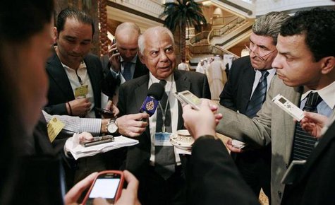 File photo of Egypt's Finance Minister Hazem el-Beblawi speaks to members of the media during a group meeting of Gulf and Arab Finance Minis File photo of Egypt's Finance Minister Hazem el-Beblawi speaks to members of the media during a group meeting of Gulf and Arab Finance Minis