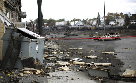 Debris from the explosion of a train are seen in Lac Megantic, July 9, 2013. REUTERS/Mathieu Belanger Debris from the explosion of a train are seen in Lac Megantic, July 9, 2013. REUTERS/Mathieu Belanger