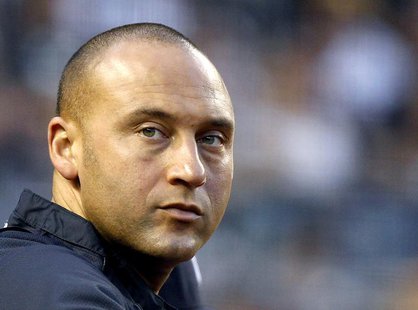 New York Yankees Derek Jeter looks on against the Boston Red Sox during the second inning of their MLB American League baseball game at Yank New York Yankees Derek Jeter looks on against the Boston Red Sox during the second inning of their MLB American League baseball game at Yank