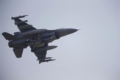 A F-16 fighter jet belonging to the U.S. Air Force comes in for a landing at a U.S. air force base in Osan, south of Seoul April 3, 2013. RE A F-16 fighter jet belonging to the U.S. Air Force comes in for a landing at a U.S. air force base in Osan, south of Seoul April 3, 2013. RE