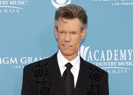 Singer Randy Travis arrives at the 45th annual Academy of Country Music Awards in Las Vegas, Nevada in this April 18, 2010 file photo. REUTE Singer Randy Travis arrives at the 45th annual Academy of Country Music Awards in Las Vegas, Nevada in this April 18, 2010 file photo. REUTE