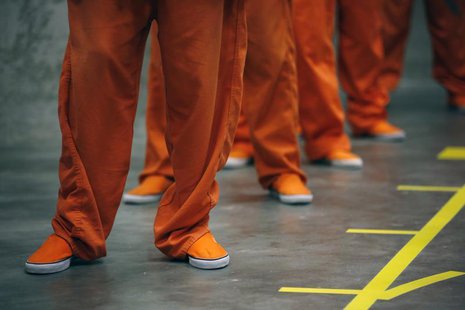 Prison inmates stand in line as they prepare to dance in opposition of violence against women as they participate in a One Billion Rising ev Prison inmates stand in line as they prepare to dance in opposition of violence against women as they participate in a One Billion Rising ev