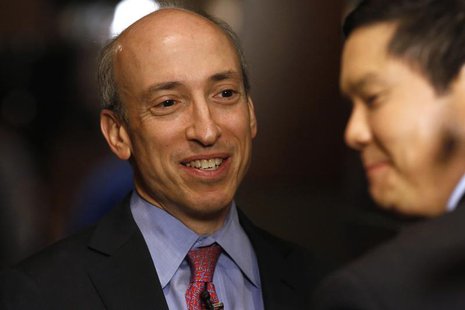 Gary Gensler, chairman of the Commodity Futures Trading Commission, speaks to a reporter at the Sandler O'Neill + Partners, L.P. Global Exch Gary Gensler, chairman of the Commodity Futures Trading Commission, speaks to a reporter at the Sandler O'Neill + Partners, L.P. Global Exch