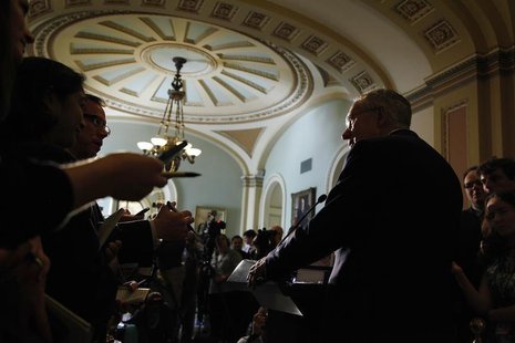 U.S. Senate Majority Leader Harry Reid (D-NV) addresses reporters after the weekly Democratic caucus luncheon at the U.S. Capitol in Washing U.S. Senate Majority Leader Harry Reid (D-NV) addresses reporters after the weekly Democratic caucus luncheon at the U.S. Capitol in Washing