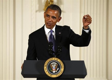 U.S. President Barack Obama makes a light reference to old movie special effects while speaking about award recipient George Lucas who creat U.S. President Barack Obama makes a light reference to old movie special effects while speaking about award recipient George Lucas who creat