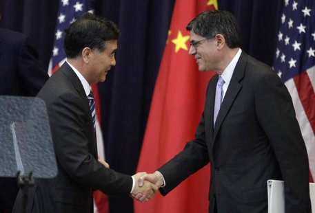 U.S. Treasury Secretary Jack Lew (R) shakes hands with Chinese Vice Premier Wang Yang after the U.S.-China Strategic and Economic Dialogue ( U.S. Treasury Secretary Jack Lew (R) shakes hands with Chinese Vice Premier Wang Yang after the U.S.-China Strategic and Economic Dialogue (