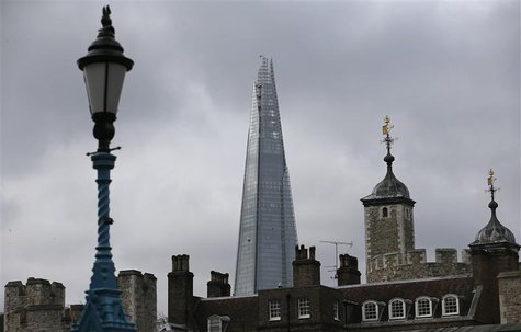 The Shard, western Europe's tallest building, is seen behind Tower of London in London February 28, 2013. REUTERS/Suzanne Plunkett The Shard, western Europe's tallest building, is seen behind Tower of London in London February 28, 2013. REUTERS/Suzanne Plunkett