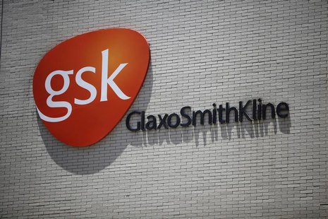 The logo of GlaxoSmithKline (GSK) is seen on its office building in Shanghai July 12, 2013. REUTERS/Aly Song The logo of GlaxoSmithKline (GSK) is seen on its office building in Shanghai July 12, 2013. REUTERS/Aly Song