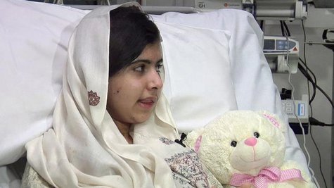 Pakistani schoolgirl, Malala Yousufzai, who was shot in the head by the Taliban for advocating girls' education, is seen sitting in her hosp Pakistani schoolgirl, Malala Yousufzai, who was shot in the head by the Taliban for advocating girls' education, is seen sitting in her hosp