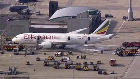 Emergency crew surrounds a Boeing 787 Dreamliner, operated by Ethiopian Airlines, which caught fire at Britain's Heathrow airport in this Ju Emergency crew surrounds a Boeing 787 Dreamliner, operated by Ethiopian Airlines, which caught fire at Britain's Heathrow airport in this Ju