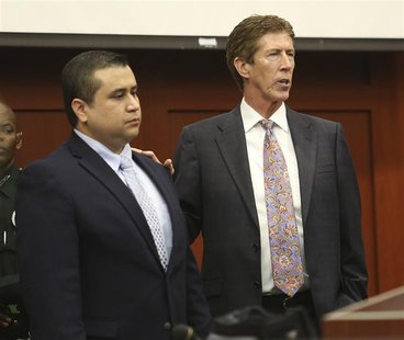 Defense counsel Mark O'Mara has George Zimmerman stand in the courtroom for the jury during defense closing arguments at his trial at the Se Defense counsel Mark O'Mara has George Zimmerman stand in the courtroom for the jury during defense closing arguments at his trial at the Se