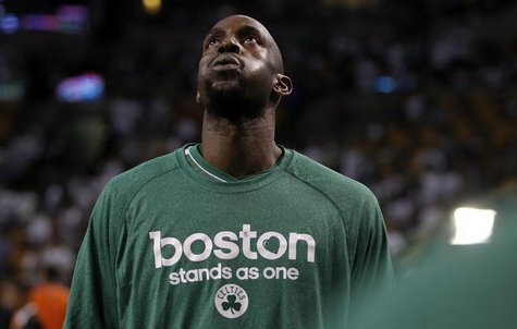 Boston Celtics Kevin Garnett wears a shirt that reads, "Boston stands as one" before the start of Game 3 of their NBA Eastern Conference sem Boston Celtics Kevin Garnett wears a shirt that reads, "Boston stands as one" before the start of Game 3 of their NBA Eastern Conference sem