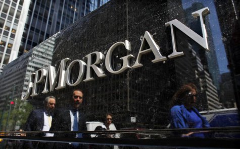 Commuters are reflected in stone as they walk past the JPMorgan headquarters in New York, in this May 17, 2012 file photo. JPMorgan Chase & Commuters are reflected in stone as they walk past the JPMorgan headquarters in New York, in this May 17, 2012 file photo. JPMorgan Chase &