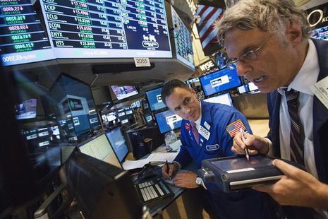 Traders work on the floor of the New York Stock Exchange shortly before the closing of the market in New York, July 11, 2013. REUTERS/Lucas Traders work on the floor of the New York Stock Exchange shortly before the closing of the market in New York, July 11, 2013. REUTERS/Lucas