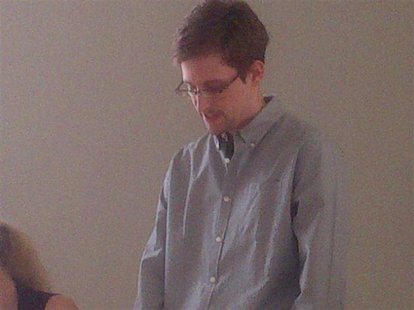 Former intelligence agency contractor Edward Snowden speaks to human rights representatives in Moscow's Sheremetyevo airport in this July 12 Former intelligence agency contractor Edward Snowden speaks to human rights representatives in Moscow's Sheremetyevo airport in this July 12