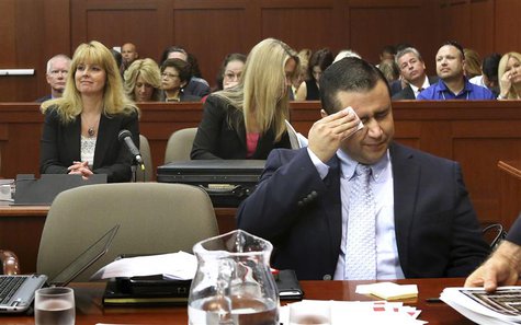 George Zimmerman wipes perspiration from his face after arriving in the courtroom for his trial in Seminole circuit court in Sanford, Florid George Zimmerman wipes perspiration from his face after arriving in the courtroom for his trial in Seminole circuit court in Sanford, Florid