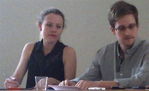 Former intelligence agency contractor Edward Snowden and Sarah Harrison (L) of WikiLeaks speak to human rights representatives in Moscow's S Former intelligence agency contractor Edward Snowden and Sarah Harrison (L) of WikiLeaks speak to human rights representatives in Moscow's S