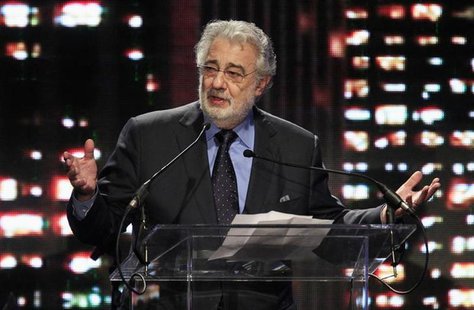 Tenor and conductor Placido Domingo, general director of the Los Angeles Opera, speaks as he accepts the "Heart of the City Award" at the Ce Tenor and conductor Placido Domingo, general director of the Los Angeles Opera, speaks as he accepts the "Heart of the City Award" at the Ce